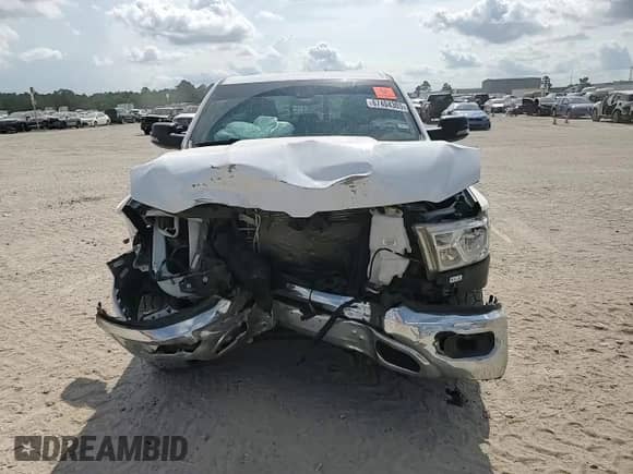 2023 Ram 1500 Lone Star with VIN 1C6SRFFT1PN692860, listed as a Copart auction lot 67404305 with 57,407 mi miles and Salvage title. Bid and sale history available at DreamBid. Image 14.