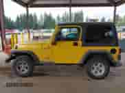 2004 Jeep Wrangler Sport z VIN 1J4FA49S04P788403, wystawiony jako IAAI lot #43184950 z przebiegiem 290 533 mil mil oraz . Historia ofert i sprzedaży dostępna na DreamBid. Obrazek 14.