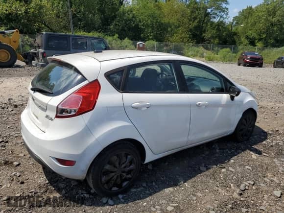 2014 Ford Fiesta S with VIN 3FADP4TJ3EM196793, listed as a Copart auction lot 68580835 with 147,220 mi miles and Clean title. Bid and sale history available at DreamBid. Image 3.
