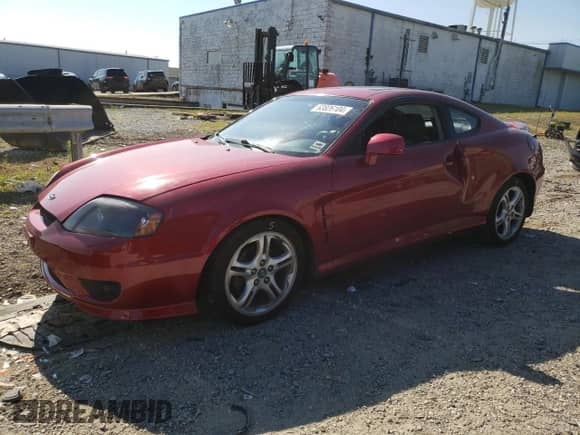 2005 Hyundai Tiburon GT с VIN KMHHN65F85U182644, выставлен на аукционе Copart как лот 63826104 с пробегом 100 245 миль миль и Списание • Salvage title. История ставок и продаж доступна на DreamBid. Изображение 1.