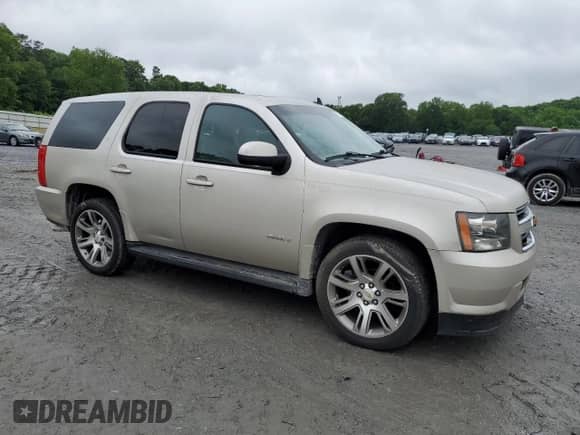 2009 Chevrolet Tahoe z VIN 1GNFC13539R120163, wystawiony jako Copart lot #58721595 z przebiegiem 183 307 mil mil oraz Czysty tytuł • Clean title. Historia ofert i sprzedaży dostępna na DreamBid. Obrazek 4.