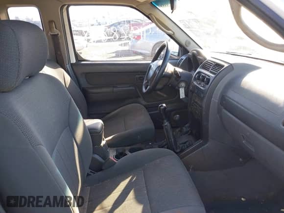 2003 Nissan Frontier XE z VIN 1N6ED26Y23C445424, wystawiony jako IAAI lot #41328888 z przebiegiem 196 611 mil mil oraz . Historia ofert i sprzedaży dostępna na DreamBid. Obrazek 5.