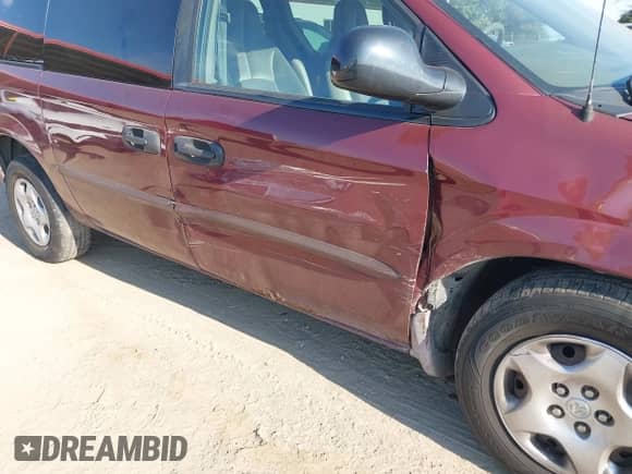 2002 Dodge Caravan SE with VIN 1B4GP24302B695983, listed as a IAAI auction lot 43060109 with 227,266 mi miles and . Bid and sale history available at DreamBid. Image 6.