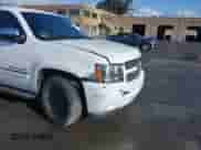 2014 Chevrolet Suburban LTZ with VIN 1GNSKKE79ER139252, listed as a IAAI auction lot 41197789 with 170,065 mi miles and . Bid and sale history available at DreamBid. Image 6.