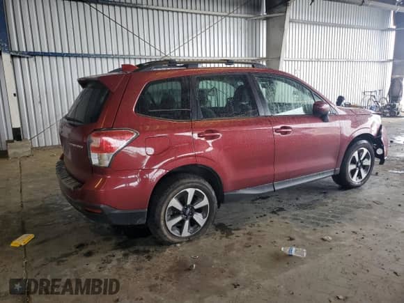2018 Subaru Forester Premium z VIN JF2SJAGC3JH459281, wystawiony jako Copart lot #82193595 z przebiegiem 112 890 mil mil oraz Szkoda całkowita • Salvage title. Historia ofert i sprzedaży dostępna na DreamBid. Obrazek 3.