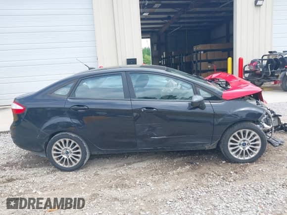 2014 Ford Fiesta S with VIN 3FADP4AJ8EM201618, listed as a IAAI auction lot 42234592 with 170,203 mi miles and . Bid and sale history available at DreamBid. Image 14.