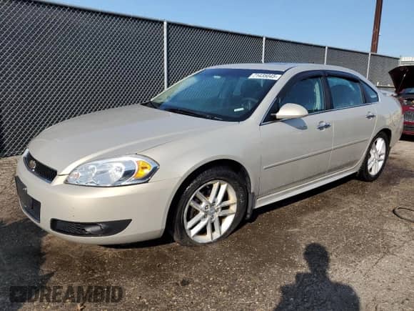 2012 Chevrolet Impala LTZ with VIN 2G1WC5E38C1257183, listed as a Copart auction lot 71435045 with 106,738 mi miles and Salvage title. Bid and sale history available at DreamBid. Image 1.
