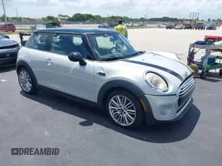2014 MINI Hardtop with VIN WMWXM5C56ET933833, listed as a IAAI auction lot 42929044 with 86,490 mi miles and . Bid and sale history available at DreamBid. Image 1.