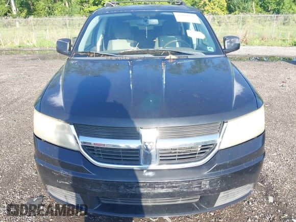2009 Dodge Journey SXT with VIN 3D4GG57VX9T568865, listed as a IAAI auction lot 42920478 with 200,952 mi miles and . Bid and sale history available at DreamBid. Image 6.