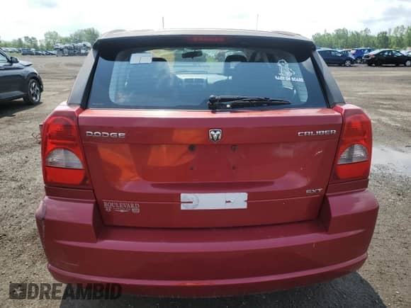 2009 Dodge Caliber SXT with VIN 1B3HB48A79D229770, listed as a Copart auction lot 58482155 with Not provided miles and Salvage title. Bid and sale history available at DreamBid. Image 6.