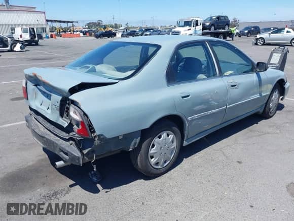 1996 Honda Accord LX with VIN 1HGCD5634TA137359, listed as a IAAI auction lot 42683307 with 228,614 mi miles and . Bid and sale history available at DreamBid. Image 4.