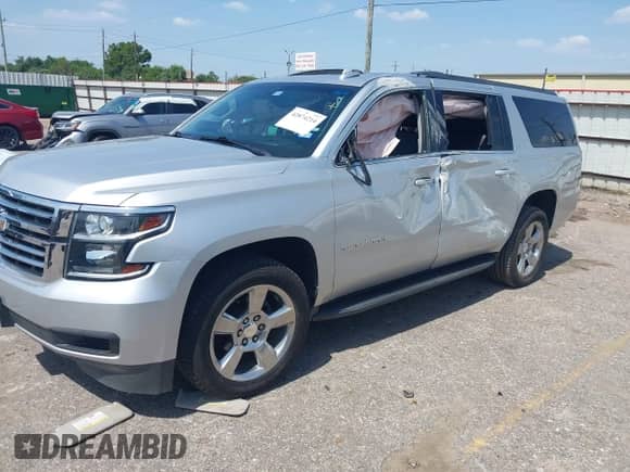2018 Chevrolet Suburban LT z VIN 1GNSCHKC7JR317414, wystawiony jako IAAI lot #42874214 z przebiegiem 98 281 mil mil oraz . Historia ofert i sprzedaży dostępna na DreamBid. Obrazek 17.