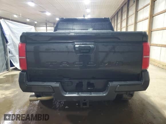 2024 Toyota Tacoma TRD Off Road with VIN 3TMLB5JN8RM005102, listed as a Copart auction lot 89516175 with 22,558 mi miles and Salvage title. Bid and sale history available at DreamBid. Image 6.