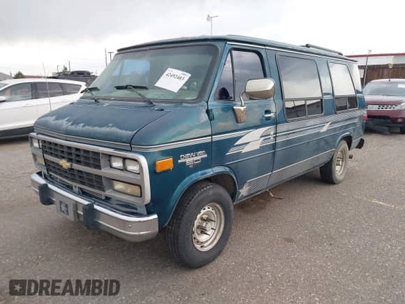 1994 Chevrolet Chevy Van with VIN 1GBEG25KXRF160098, listed as a IAAI auction lot 42492403 with 142,499 mi miles and . Bid and sale history available at DreamBid. Image 2.