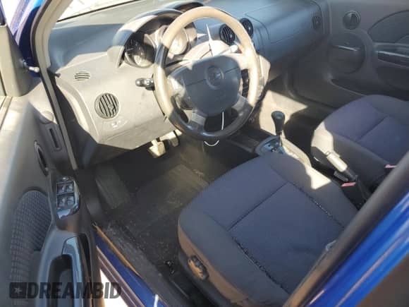 2006 Chevrolet Aveo LS с VIN KL1TD66636B676401, выставлен на аукционе Copart как лот 44761155 с пробегом 86 936 миль миль и Списание • Salvage title. История ставок и продаж доступна на DreamBid. Изображение 8.