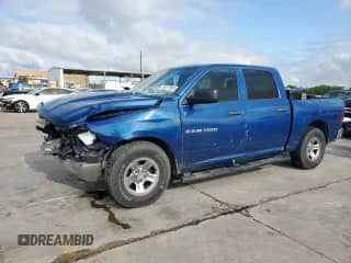 2011 Ram 1500 ST с VIN 1D7RB1CP2BS597052, выставлен на аукционе Copart как лот 56197505 с пробегом 128 837 миль миль и Списание • Salvage title. История ставок и продаж доступна на DreamBid. Изображение 1.