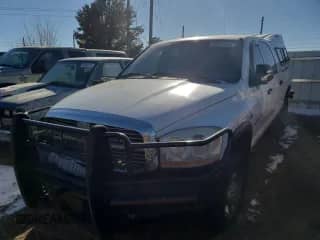 2006 Dodge 3500 Laramie with VIN 3D7LX39C56G285795, listed as a Copart auction lot 83461404 with 326,401 mi miles and Salvage title. Bid and sale history available at DreamBid. Image 1.