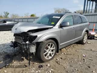 2012 Dodge Journey R/T with VIN 3C4PDDFG1CT171250, listed as a Copart auction lot 54052735 with 166,835 mi miles and Salvage title. Bid and sale history available at DreamBid. Image 1.