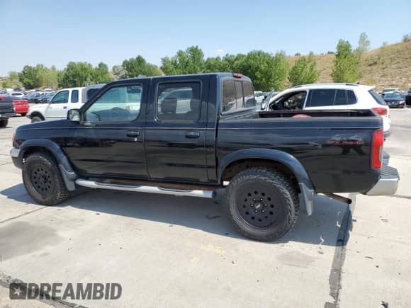 2000 Nissan Frontier XE with VIN 1N6ED27Y8YC409808, listed as a Copart auction lot 69052025 with 204,106 mi miles and Clean title. Bid and sale history available at DreamBid. Image 2.