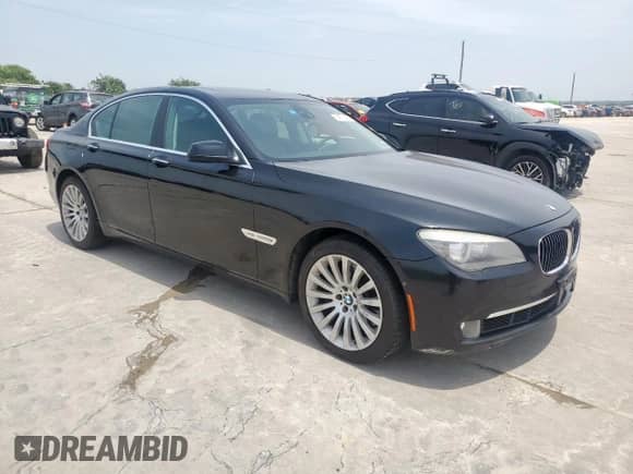 2012 BMW 7 Series 750i xDrive with VIN WBAKC6C55CC395741, listed as a Copart auction lot 54731405 with 166,193 mi miles and Clean title. Bid and sale history available at DreamBid. Image 4.