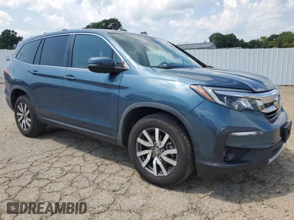 2021 Honda Pilot EX with VIN 5FNYF5H35MB014240, listed as a Copart auction lot 63614555 with 122,078 mi miles and Salvage title. Bid and sale history available at DreamBid. Image 4.