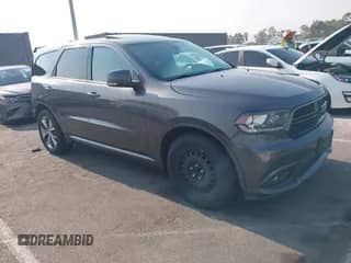 2014 Dodge Durango R/T with VIN 1C4SDHCT1EC405517, listed as a IAAI auction lot 42900132 with 141,872 mi miles and . Bid and sale history available at DreamBid. Image 1.
