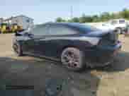 2016 Dodge Charger R/T with VIN 2C3CDXCTXGH104909, listed as a Copart auction lot 58464175 with 135,097 mi miles and Salvage title. Bid and sale history available at DreamBid. Image 2.