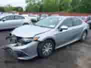 2022 Toyota Camry Hybrid LE with VIN 4T1C31AK4NU588863, listed as a IAAI auction lot 42375893 with 218,285 mi miles and . Bid and sale history available at DreamBid. Image 18.