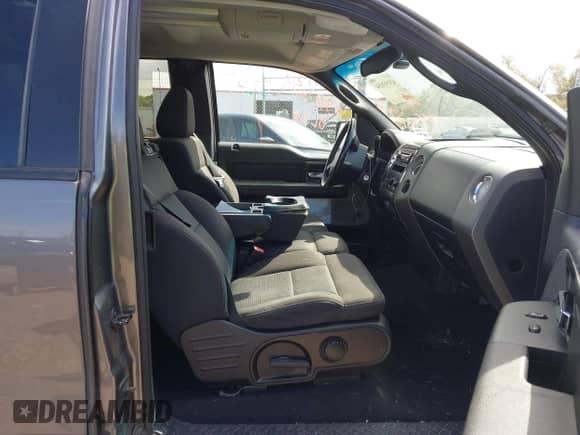 2005 Ford F-150 XLT with VIN 1FTPX14575FA86014, listed as a IAAI auction lot 43193154 with 171,713 mi miles and . Bid and sale history available at DreamBid. Image 5.