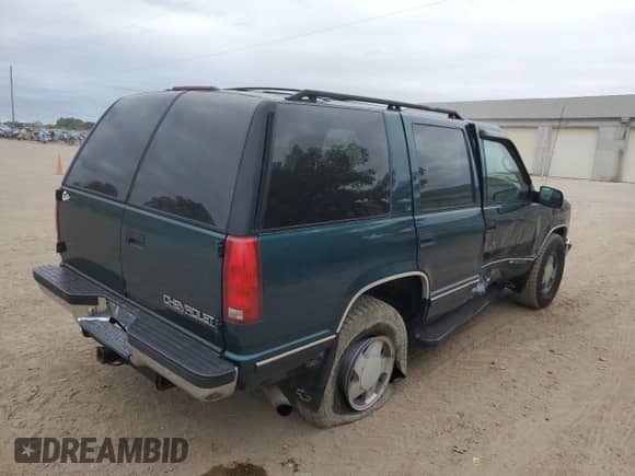 1997 Chevrolet Tahoe с VIN 1GNEK13R4VJ419381, выставлен на аукционе Copart как лот 80735365 с пробегом 158 890 миль миль и Списание • Salvage title. История ставок и продаж доступна на DreamBid. Изображение 3.