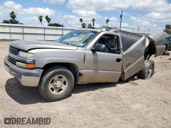 2000 Chevrolet Silverado 1500 with VIN 1GCEC14W0YE189118, listed as a Copart auction lot 63465025 with 185,329 mi miles and Salvage title. Bid and sale history available at DreamBid. Image 1.