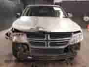 2013 Dodge Journey SE z VIN 3C4PDCAB7DT646083, wystawiony jako IAAI lot #42353530 z przebiegiem 117 965 mil mil oraz . Historia ofert i sprzedaży dostępna na DreamBid. Obrazek 13.