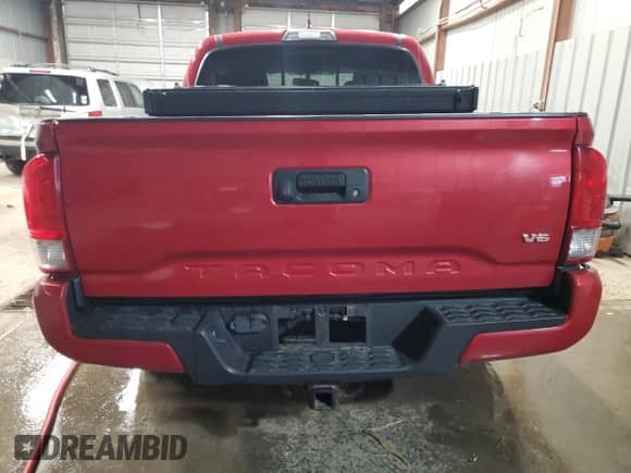 2017 Toyota Tacoma SR5 with VIN 5TFCZ5AN7HX093726, listed as a Copart auction lot 82410365 with 76,422 mi miles and Salvage title. Bid and sale history available at DreamBid. Image 6.