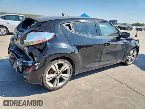 2014 Hyundai Veloster с VIN KMHTC6AD0EU186286, выставлен на аукционе Copart как лот 82402835 с пробегом 88 126 миль миль и Списание • Salvage title. История ставок и продаж доступна на DreamBid. Изображение 3.