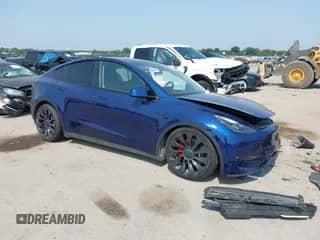 2023 Tesla Model Y Performance with VIN 7SAYGDEF1PF614332, listed as a IAAI auction lot 42915683 with Not provided miles and . Bid and sale history available at DreamBid. Image 1.