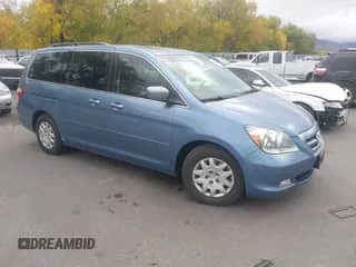 2005 Honda Odyssey Touring z VIN 5FNRL38835B057599, wystawiony jako IAAI lot #43534468 z przebiegiem 292 393 mil mil oraz . Historia ofert i sprzedaży dostępna na DreamBid. Obrazek 1.