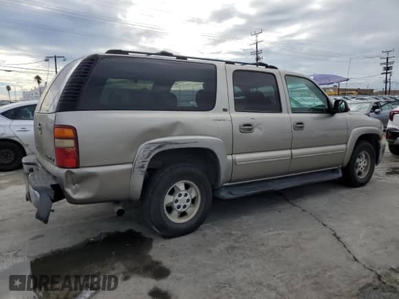 2001 Chevrolet Suburban LS с VIN 3GNEC16TX1G287873, выставлен на аукционе Copart как лот 81099135 с пробегом 269 607 миль миль и Списание • Salvage title. История ставок и продаж доступна на DreamBid. Изображение 3.