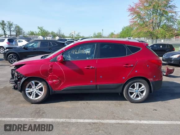 2011 Hyundai Tucson Limited with VIN KM8JUCAC4BU143656, listed as a IAAI auction lot 42144244 with 128,470 mi miles and . Bid and sale history available at DreamBid. Image 14.