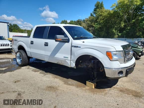 2013 Ford F-150 Lariat with VIN 1FTFW1ET9DKG40123, listed as a Copart auction lot 85496405 with 212,562 mi miles and Salvage title. Bid and sale history available at DreamBid. Image 4.
