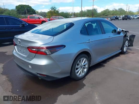 2023 Toyota Camry LE with VIN 4T1C11AK1PU115527, listed as a IAAI auction lot 43097637 with 23,926 mi miles and . Bid and sale history available at DreamBid. Image 4.