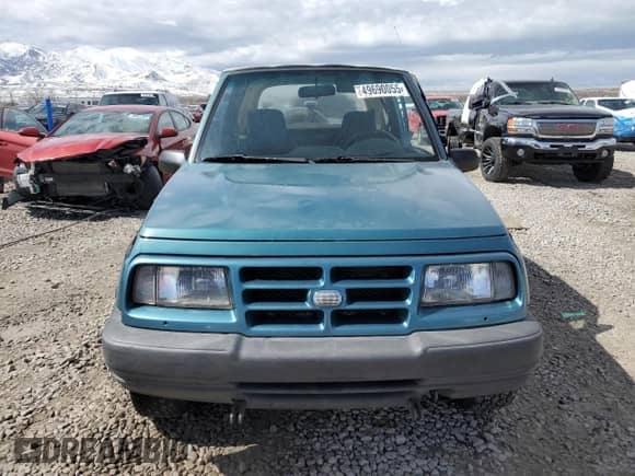 1996 Chevrolet Tracker с VIN 2CNBJ1869T6903615, выставлен на аукционе Copart как лот 49690055 с пробегом 144 821 миль миль и Списание • Salvage title. История ставок и продаж доступна на DreamBid. Изображение 5.