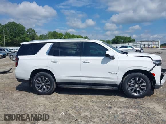 2021 Chevrolet Tahoe LT z VIN 1GNSKNKD8MR376759, wystawiony jako IAAI lot #42686035 z przebiegiem 41 568 mil mil oraz . Historia ofert i sprzedaży dostępna na DreamBid. Obrazek 13.