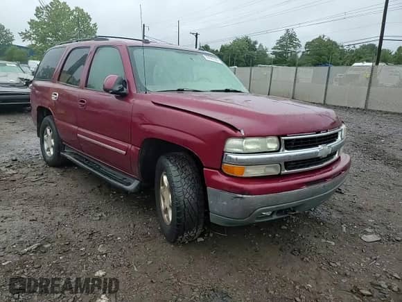 2004 Chevrolet Tahoe LT z VIN 1GNEK13Z54J275127, wystawiony jako Copart lot #69592305 z przebiegiem 174 091 mil mil oraz Szkoda całkowita • Salvage title. Historia ofert i sprzedaży dostępna na DreamBid. Obrazek 14.