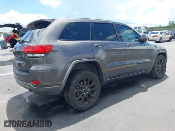 2020 Jeep Grand Cherokee Altitude with VIN 1C4RJEAG2LC428846, listed as a IAAI auction lot 43051607 with 66,769 mi miles and . Bid and sale history available at DreamBid. Image 4.