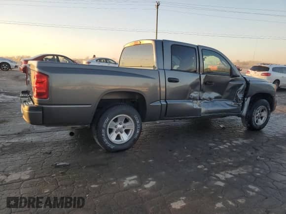 2009 Dodge Dakota with VIN 1D3HE38K09S818834, listed as a Copart auction lot 88713675 with 152,083 mi miles and Salvage title. Bid and sale history available at DreamBid. Image 3.