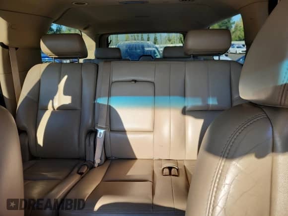 2007 Chevrolet Suburban LTZ с VIN 1GNFK16377J204561, выставлен на аукционе Copart как лот 81766155 с пробегом 214 418 миль миль и Чистый • Clean title. История ставок и продаж доступна на DreamBid. Изображение 10.