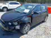 2016 Chevrolet Sonic LT with VIN 1G1JC6SB0G4155737, listed as a IAAI auction lot 41882497 with 89,993 mi miles and . Bid and sale history available at DreamBid. Image 2.