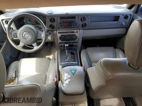 2006 Jeep Commander z VIN 1J8HG48K16C238399, wystawiony jako Copart lot #80860945 z przebiegiem 306 837 mil mil oraz Szkoda całkowita • Salvage title. Historia ofert i sprzedaży dostępna na DreamBid. Obrazek 8.