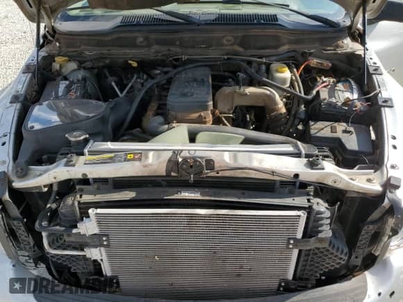 2005 Dodge 2500 SLT z VIN 3D7KR28C35G740661, wystawiony jako Copart lot #74216064 z przebiegiem 224 060 mil mil oraz Szkoda całkowita • Salvage title. Historia ofert i sprzedaży dostępna na DreamBid. Obrazek 11.