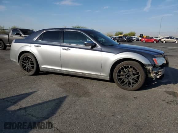 2013 Chrysler 300 C with VIN 2C3CCAET5DH674003, listed as a Copart auction lot 69129405 with 110,600 mi miles and Salvage title. Bid and sale history available at DreamBid. Image 4.